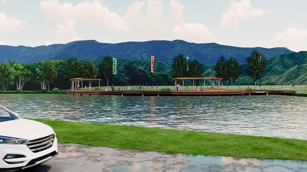 Lago y zona de ventas en uno de los proyectos Bethel